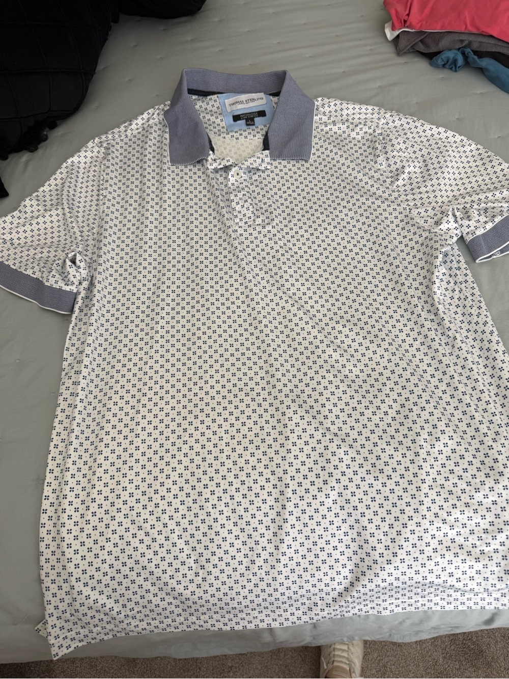 White Polo with Navy Micro-Pattern and Contrast Collar